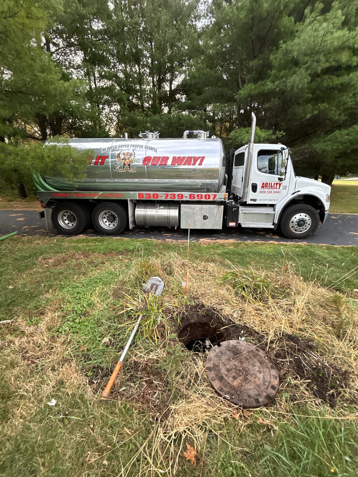 Ability Septic truck with the FLING IT OUR WAY lettering