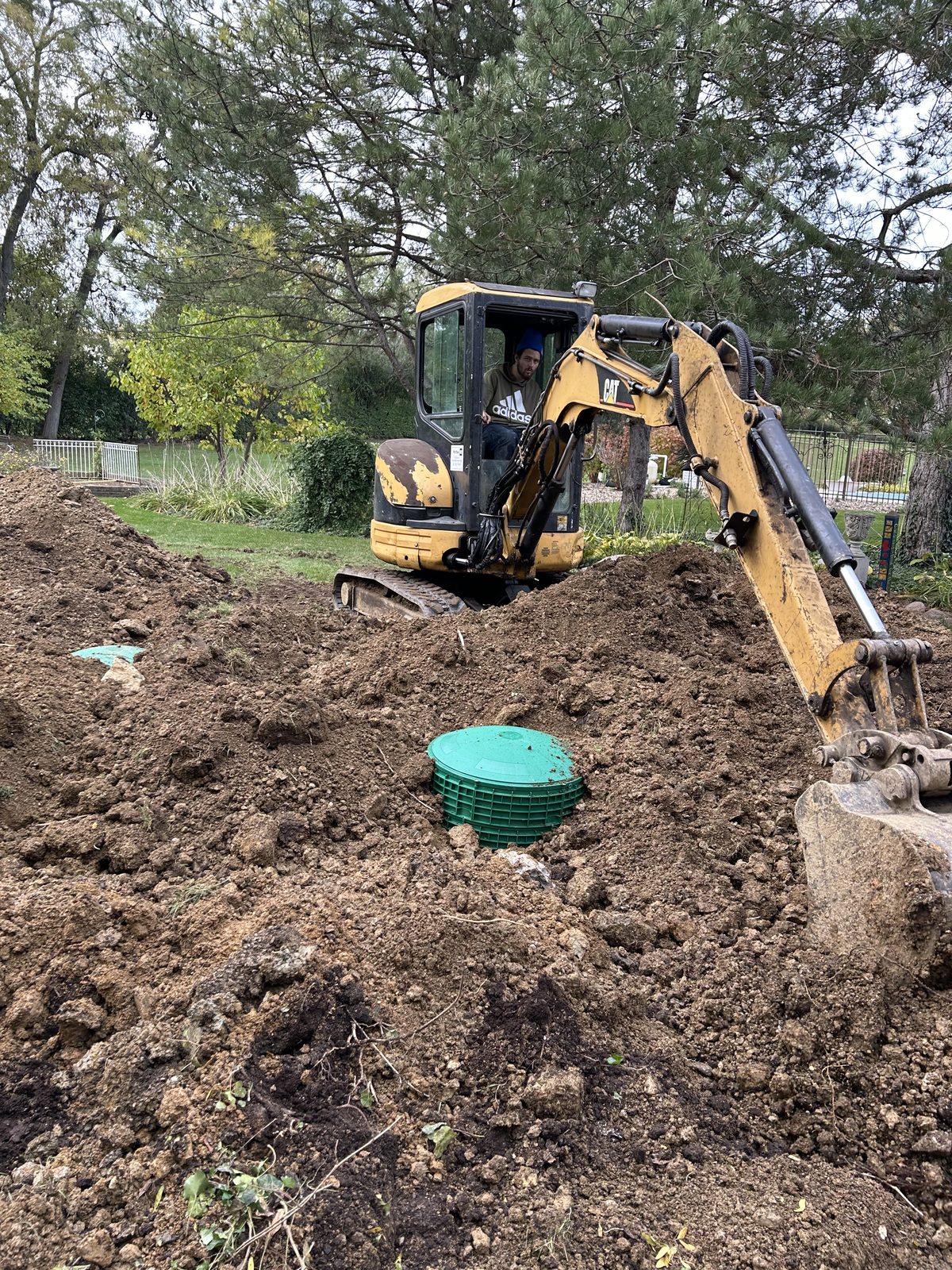 Excavator working a septic installation
