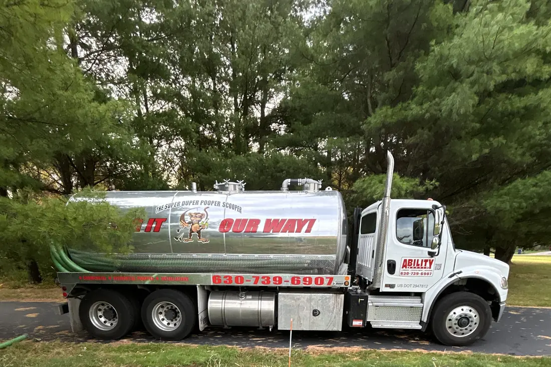 Ability truck side — Super Duper Pooper Scooper lettering